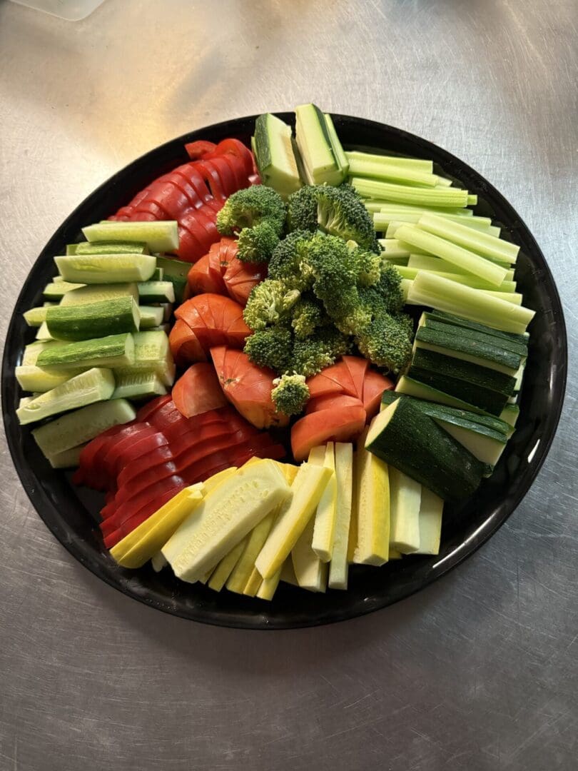 Colorful platter of assorted fresh vegetables.